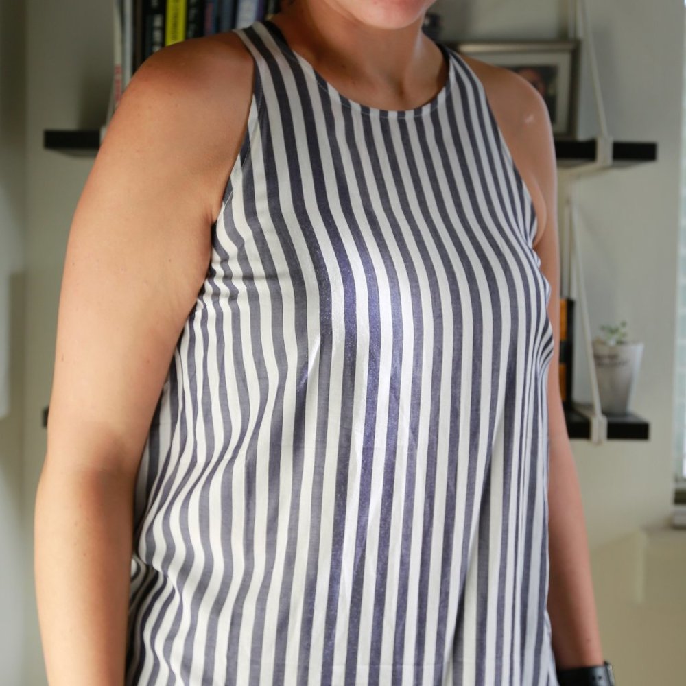 Blue and White striped sleeveless shirt